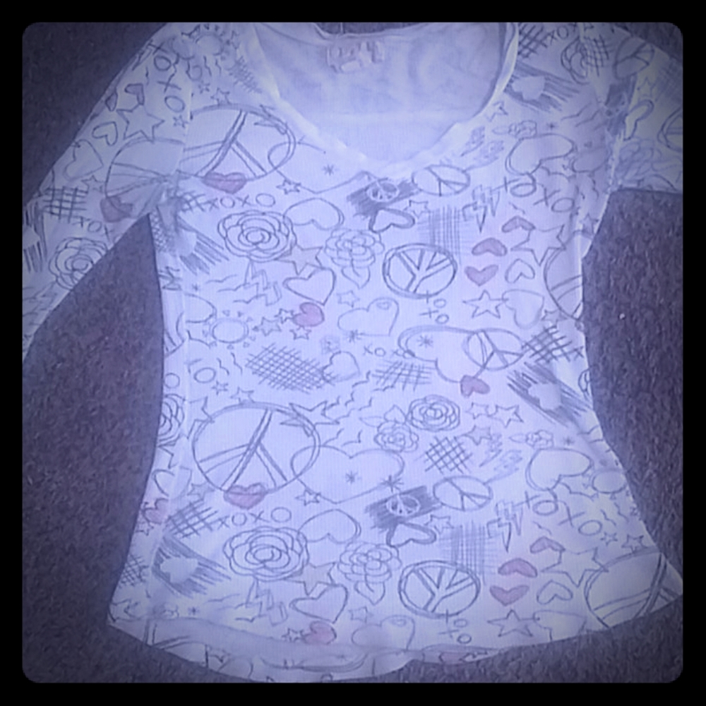 long sleeved shirt with multiple girl logos on it
